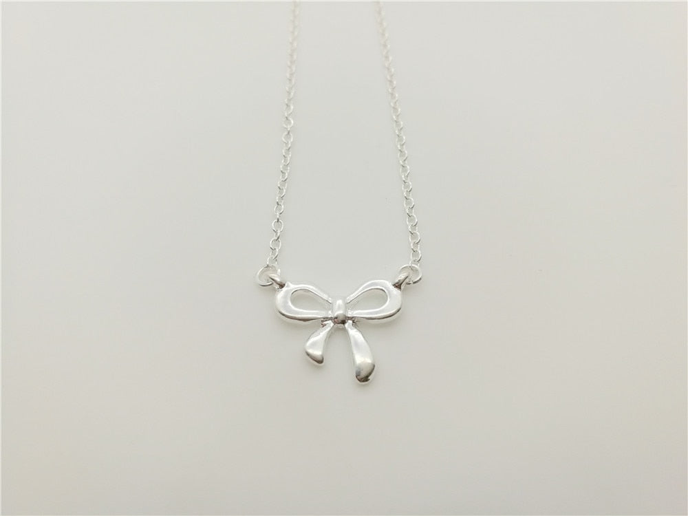 Cute and compact Bow Necklace for Women's Wedding Lucky Blessing hollow bow-knot small rosette pendant Necklace Jewelry
