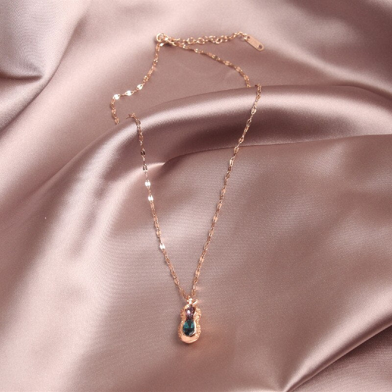 Korean design jewelry simple titanium steel clavicle peanut color crystal pendant female necklace pearl necklace