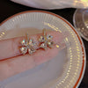 2023 New Style Simple Hollow-out Flower Pearl Celebrity Atmosphere Earrings Retro Earrings Earrings for Women