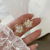 2023 New Style Simple Hollow-out Flower Pearl Celebrity Atmosphere Earrings Retro Earrings Earrings for Women