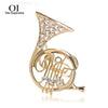 Bucomeoi Trumpet Shaped Brooches Women Crystal Gold-color Costume Music Brooch Musician Shirts Hijab Pins Corsages - Image 1