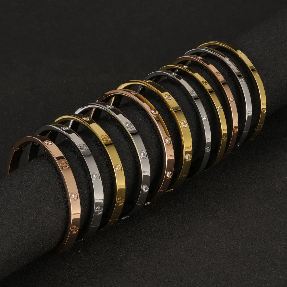 Stainless Steel Cuff Bangle with Crystal Details in Multiple Designs - Image 1