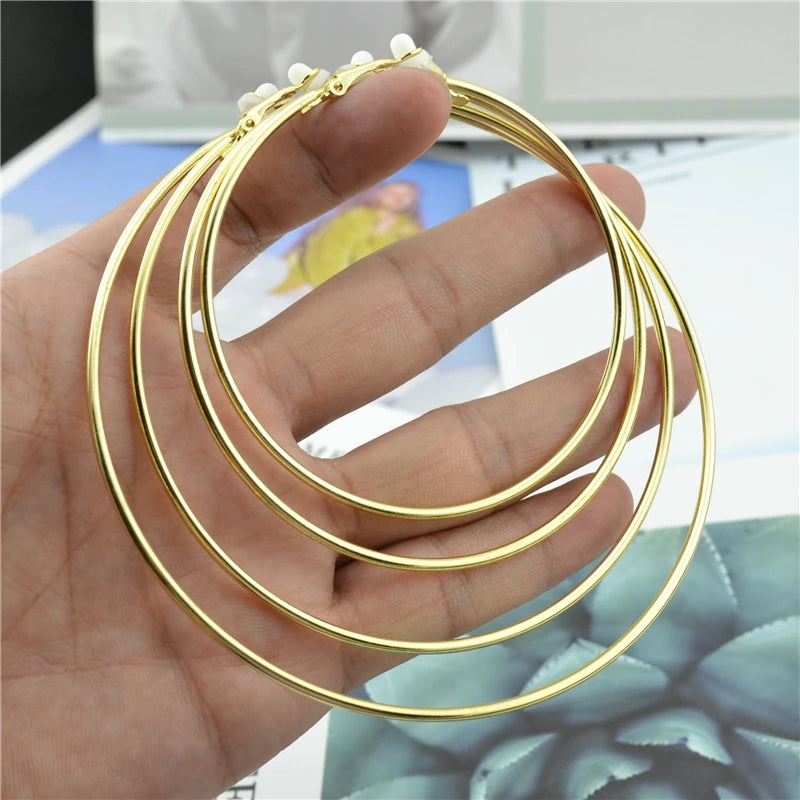 Large Circle Clip-On Earrings with Metallic Finish - Image 1