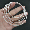 Large Circle Clip-On Earrings with Metallic Finish - Image 6