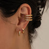 Cubic Zirconia Huggie Hoop Earrings in Gold-Tone Stainless Steel - Image 52