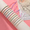 12-Piece Multicolor Resin Bead Bracelet Set with Adjustable Rope Design - Image 4