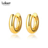 Stainless Steel Huggie Hoop Earrings in Gold-Tone or Silver-Tone - Image 1