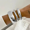Wide Metal Spring Cuff Bangle with Geometric Coil Design - Image 3