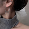 Irregular Twisted Hoop Earrings with Sculptural Metal Profile - Image 7