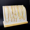 Eleven-Piece Pearl Choker Necklace Set with Mixed Pendant Designs - Image 4