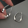 Zinc Alloy Drop Hoop Earrings in Gold-Tone and Silver-Tone Styles - Image 1
