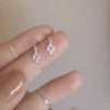 Crystal Stud Earrings in Floral and Butterfly Designs - Image 20