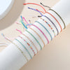 12-Piece Multicolor Resin Bead Bracelet Set with Adjustable Rope Design - Image 5