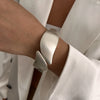 Wide Wave Cuff Bangle in Matte Gold-Tone and Silver-Tone Alloy - Image 7