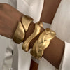 Wide Wave Cuff Bangle in Matte Gold-Tone and Silver-Tone Alloy - Image 14
