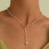 Imitation Pearl Tassel Y Necklace with Bow in Black or White - Image 2