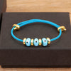 Adjustable Turkish Evil Eye Rope Bracelet in Multiple Colors - Image 9