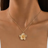 Textured Flower Pendant Necklace on Fine Chain - Image 1