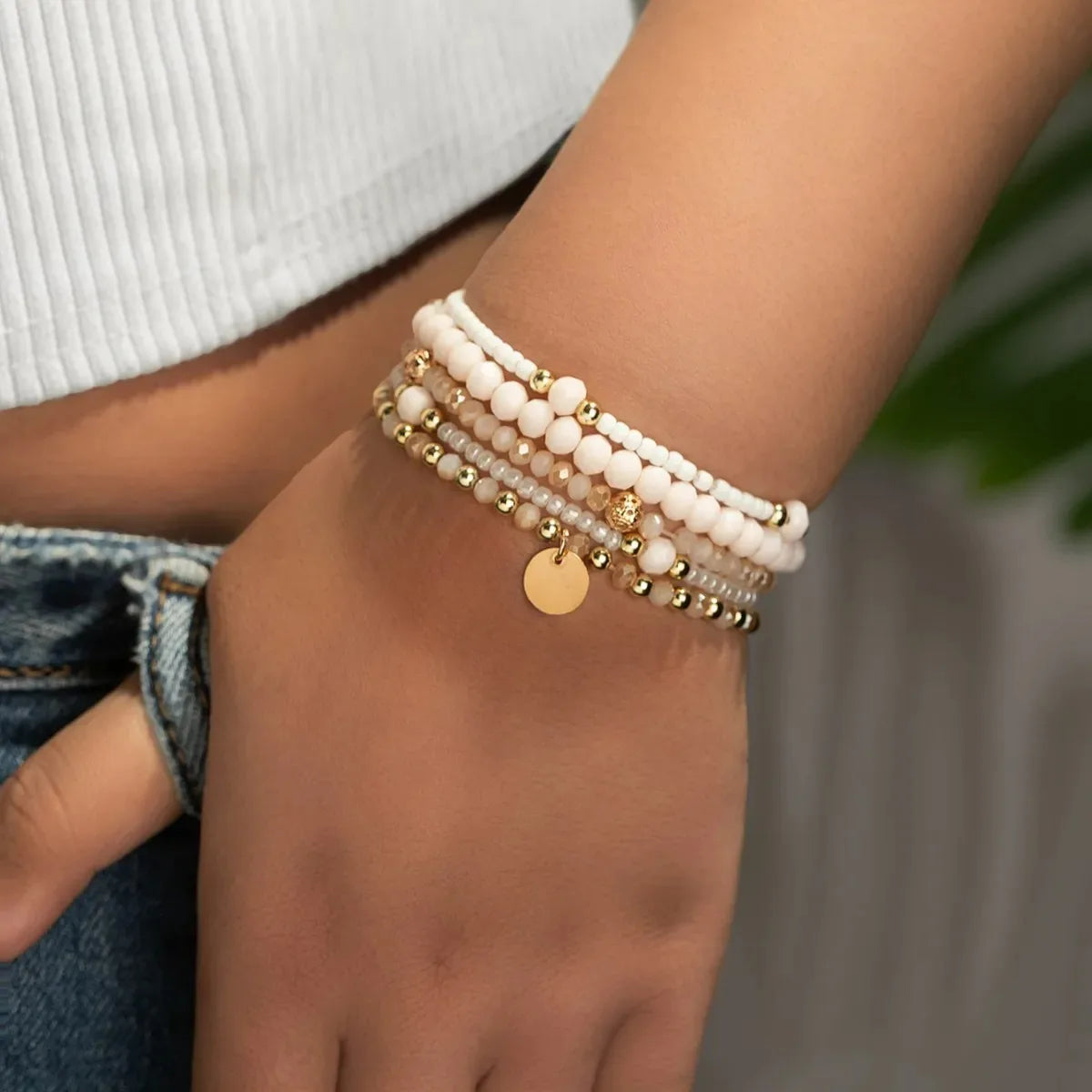 Five-Piece Resin Bead Bracelet Set with Round Charms and Elastic Bands - Image 1