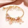 Heart-Shaped Bracelet with Bow Detail in Gold-Tone - Image 6