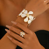 2Pcs Gold Flower Enamel Jewelry Set for Women Adjustable Cuff Bangle Ring Elegant Summer Beach Vacation Gift - Image 1