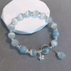 Blue Stone Bead Bracelet with Oval Pendant and Adjustable Fit - Image 2