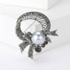 Rhinestone Flower Brooch Pin with Pearl and Leaf Designs - Image 13
