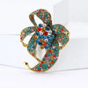 Rhinestone Flower Brooch Pin with Pearl and Leaf Designs - Image 3