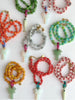 Glass Bead Necklace with Pumpkin Beads and Tree or Fish Pendants - Image 1
