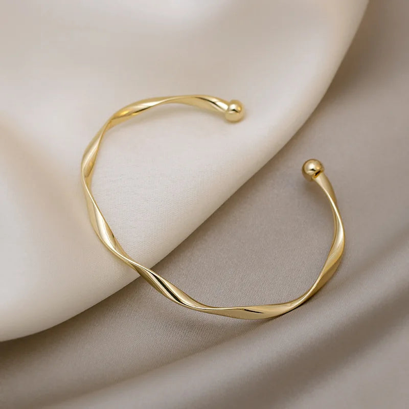 Twisted Open Cuff Bangle in Gold-Tone - Image 1