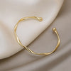 Twisted Open Cuff Bangle in Gold-Tone - Image 1