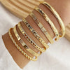 Seven-Piece Metal Bangle Set with Heart Motifs in Gold-Tone or Silver-Tone - Image 2