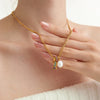 Pearl Look Bead Necklace with Clear Stone Pendant in Gold Tone - Image 2