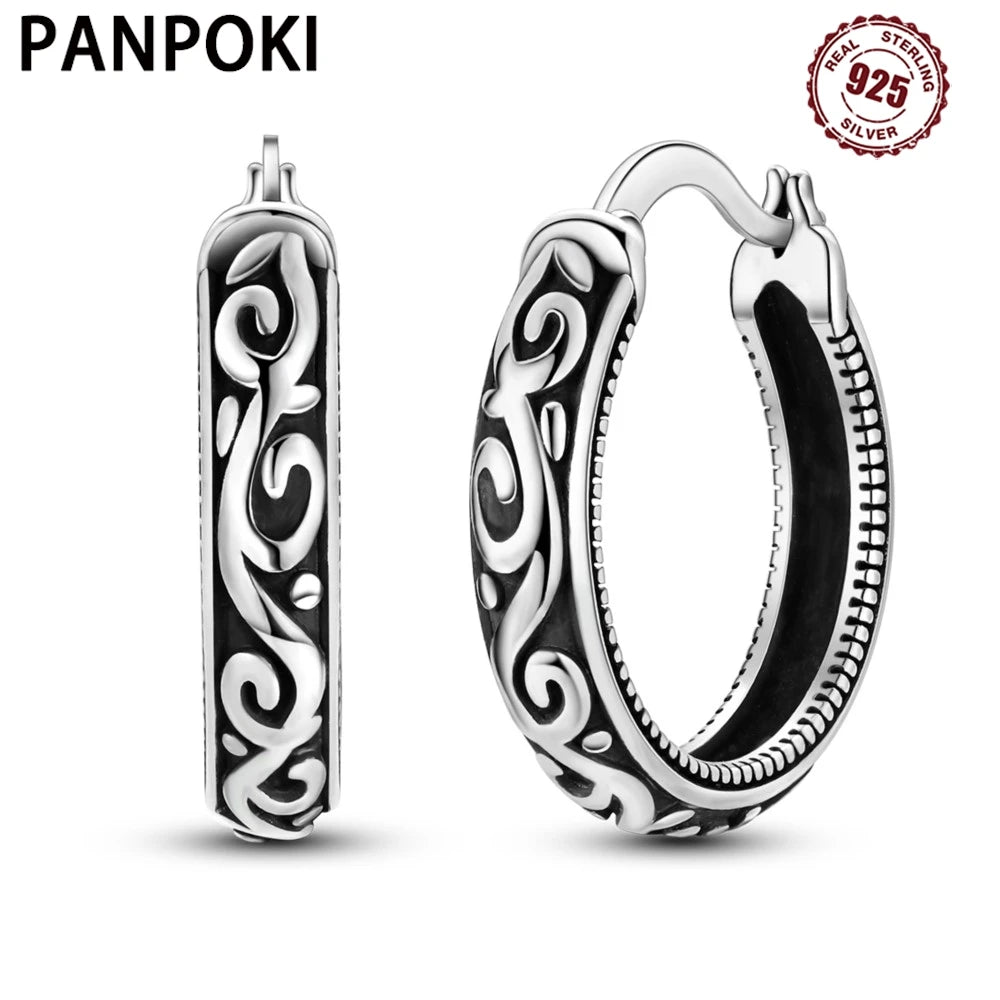 Openwork Leaf Pattern Hoop Earrings with Sculpted Detail - Image 1