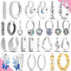 Small Hoop Earrings with Butterfly and Heart Motifs - Image 1