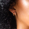Cubic Zirconia Huggie Hoop Earrings in Gold-Tone Stainless Steel - Image 53