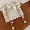 Elegant White Acrylic Bowknot Drop Earrings for Women Wedding Party Imitation Pearl Tassel Long Dangle Earrings Jewelry - Image 1