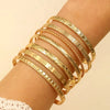 Seven-Piece Metal Bangle Set with Heart Motifs in Gold-Tone or Silver-Tone - Image 8