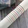 12-Piece Multicolor Resin Bead Bracelet Set with Adjustable Rope Design - Image 9