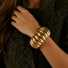 Elegant Chunky Matte Gold Ribbed Bracelet Sculptural Statement Accessory For Womens Everyday And Evening Styling - Image 2