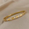316L Stainless Steel Bangle Bracelet with Cubic Zirconia Details in Gold-Tone - Image 10