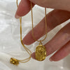 Stainless Steel Tulip Rose Pendant Necklace in Gold-Tone or Silver-Tone - Image 1