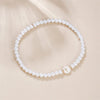 A-Z Initial Letter Bracelet for Women White Beads Round Pendant Elastic Bracelets Jewelry Mother of Pearl Charm - Image 24