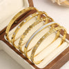 316L Stainless Steel Bangle Bracelet with Cubic Zirconia Details in Gold-Tone - Image 38
