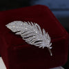 Rhinestone Feather Brooch Pin in Gold-Tone and Silver-Tone Styles - Image 1