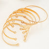 Seven Piece Heart Print Open Bangle Set in Gold Tone - Image 11