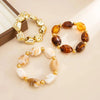 Three Piece Acrylic Bead Bracelet Set with Baroque Style Accents - Image 14