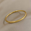 316L Stainless Steel Bangle Bracelet with Cubic Zirconia Details in Gold-Tone - Image 7