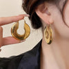 U-Shaped Chunky Hoop Earrings with Geometric Profile - Image 11