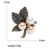 Rhinestone Flower Brooch Pin with Pearl and Leaf Designs - Image 33
